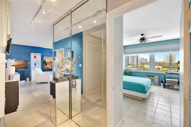 3233 NE 34th St Unit 611, Fort Lauderdale, FL 33308 - corridor with track lighting, an AC wall unit, and a city view
