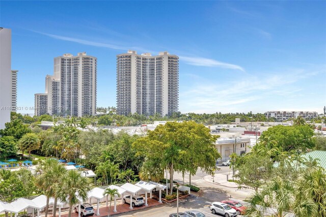 3233 NE 34th St Unit 611, Fort Lauderdale, FL 33308 - view of property featuring a view of city and uncovered parking