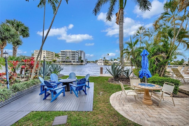 3233 NE 34th St Unit 611, Fort Lauderdale, FL 33308 - view of patio / terrace with a fire pit and a water view