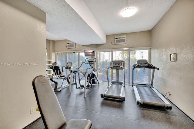 3233 NE 34th St Unit 611, Fort Lauderdale, FL 33308 - exercise room featuring plenty of natural light and a textured wall
