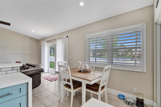 411 NW 201st Ave, Pembroke Pines, FL 33029 - dining room featuring light tile patterned floors, a textured ceiling, and recessed lighting