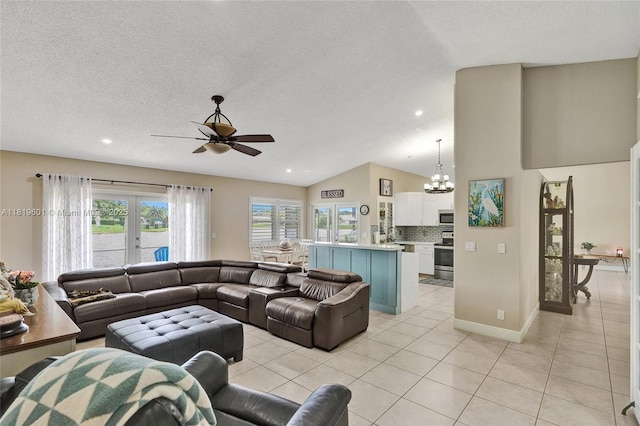 411 NW 201st Ave, Pembroke Pines, FL 33029 - living area with light tile patterned floors, a chandelier, a ceiling fan, a textured ceiling, and lofted ceiling
