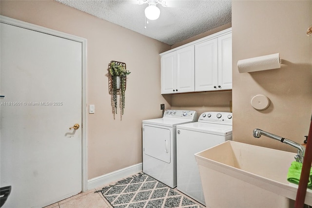411 NW 201st Ave, Pembroke Pines, FL 33029 - laundry room with washing machine and clothes dryer, cabinet space, a textured ceiling, light tile patterned floors, and ceiling fan
