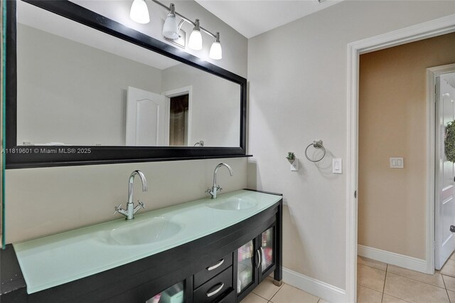 411 NW 201st Ave, Pembroke Pines, FL 33029 - bathroom featuring double vanity and tile patterned flooring