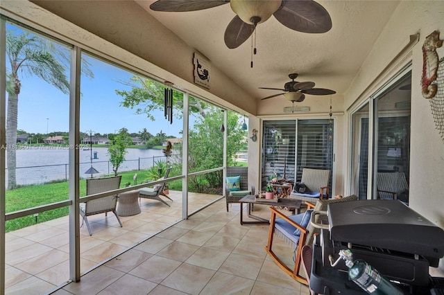 411 NW 201st Ave, Pembroke Pines, FL 33029 - sunroom with a water view, a ceiling fan, and plenty of natural light