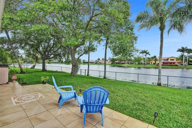 411 NW 201st Ave, Pembroke Pines, FL 33029 - view of patio / terrace with a water view