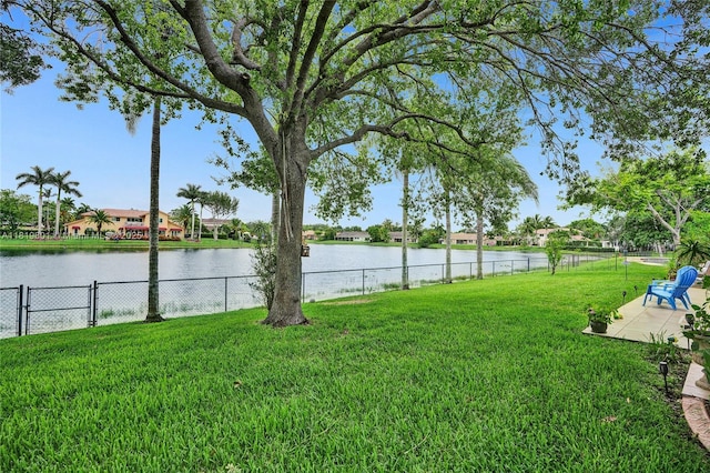 411 NW 201st Ave, Pembroke Pines, FL 33029 - view of yard featuring a water view and a patio area