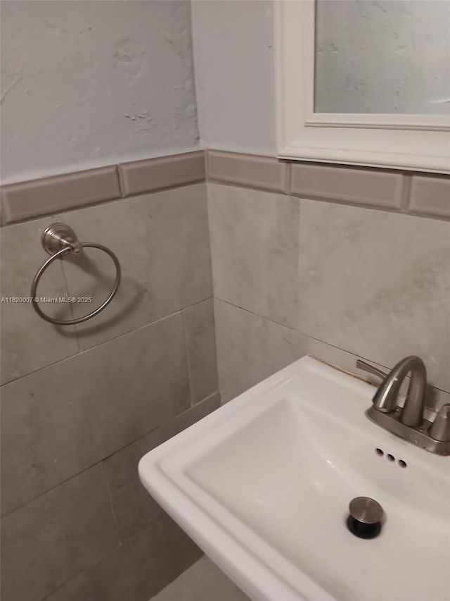 357 SW 1st Ter, Deerfield Beach, FL 33441 - bathroom with a sink and tile walls