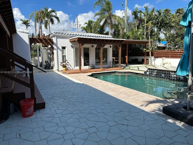 659 NE 73rd St, Miami, FL 33138 - view of pool featuring a patio area and a pergola