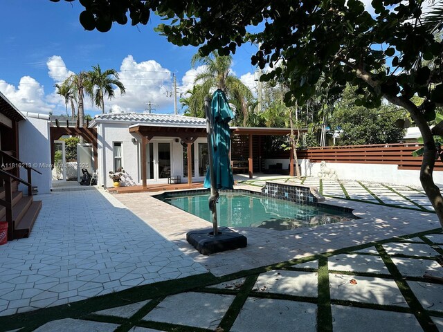 659 NE 73rd St, Miami, FL 33138 - view of pool with french doors and a patio