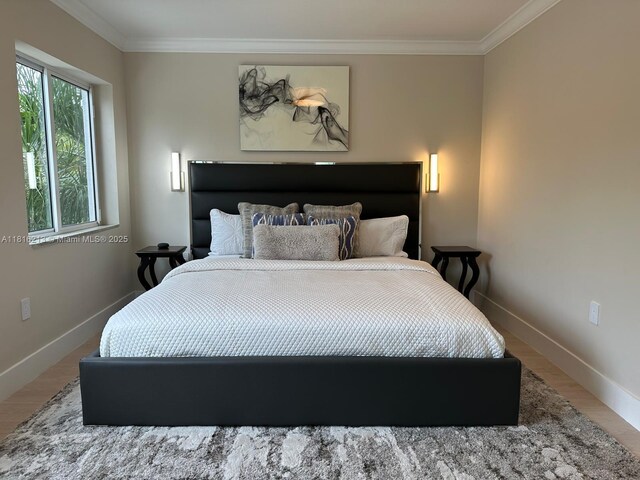 659 NE 73rd St, Miami, FL 33138 - bedroom featuring ornamental molding and wood finished floors