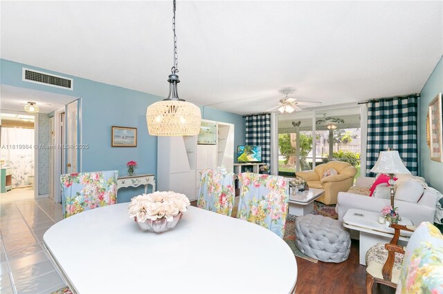 1001 NE 14th Ave Unit 107, Hallandale Beach, FL 33009 - dining room with a ceiling fan