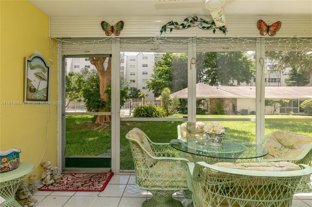 1001 NE 14th Ave Unit 107, Hallandale Beach, FL 33009 - sunroom with tile patterned floors
