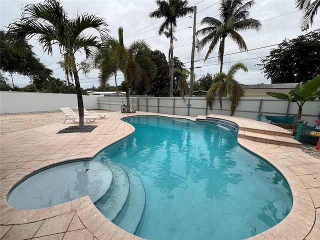 3329 Coolidge St, Hollywood, FL 33021 - view of pool with a patio and a fenced backyard
