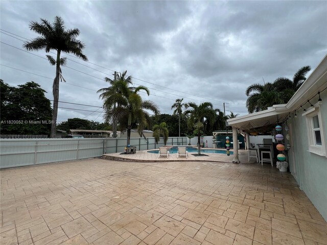 3329 Coolidge St, Hollywood, FL 33021 - view of pool featuring a patio and a fenced backyard