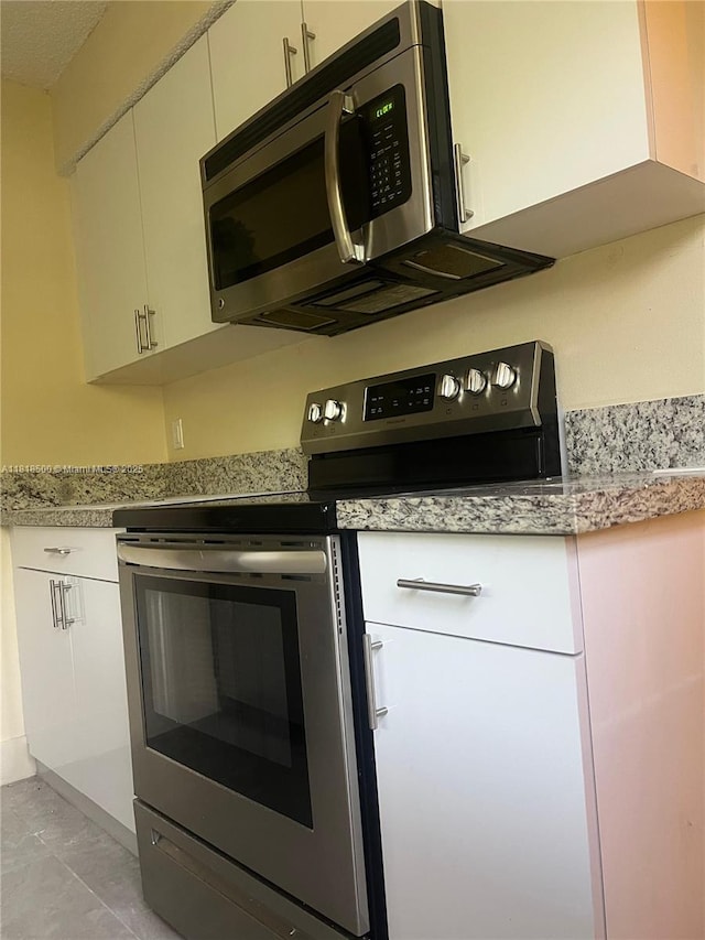 805 N Franklin Ave Unit 805D, Homestead, FL 33034 - kitchen featuring stainless steel appliances and light marble finish flooring