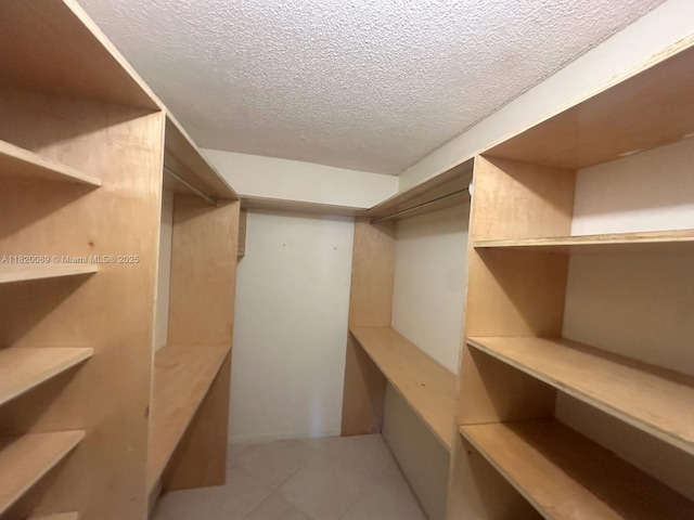 523 Trace Cir Unit 105, Deerfield Beach, FL 33441 - spacious closet featuring tile patterned flooring