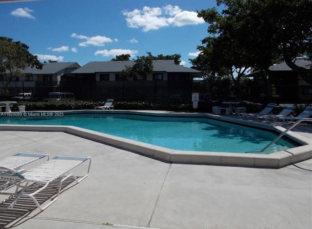 523 Trace Cir Unit 105, Deerfield Beach, FL 33441 - community pool featuring a patio