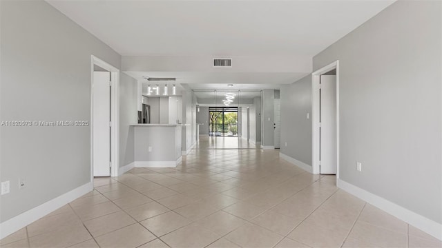 5550 NW 44th St Unit 205B, Lauderhill, FL 33319 - unfurnished room featuring light tile patterned floors and baseboards