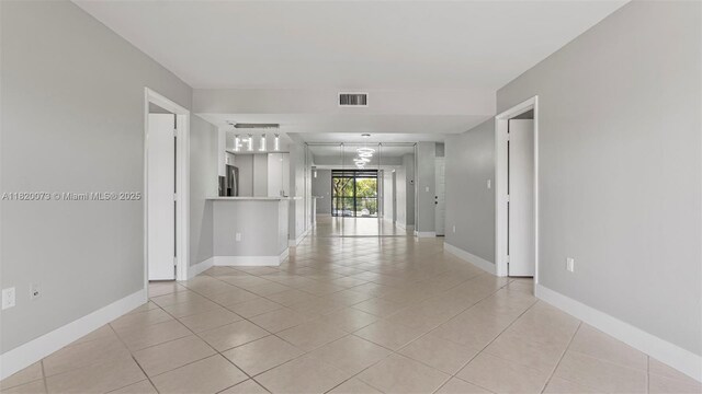 5550 NW 44th St Unit 205B, Lauderhill, FL 33319 - unfurnished room featuring light tile patterned floors and baseboards