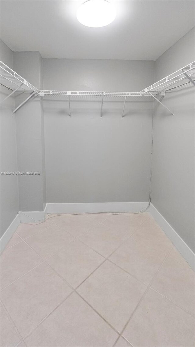 5550 NW 44th St Unit 205B, Lauderhill, FL 33319 - walk in closet with light tile patterned flooring