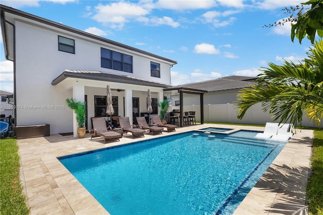 17540 SW 46th St, Miramar, FL 33029 - rear view of property featuring stucco siding, a patio area, a pool with connected hot tub, and ceiling fan