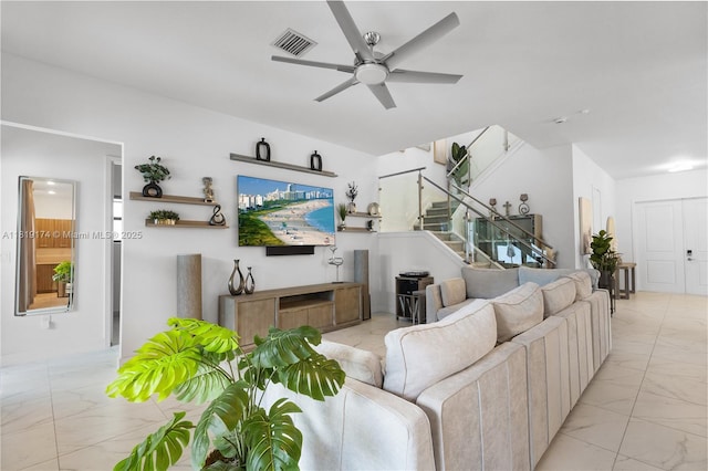 17540 SW 46th St, Miramar, FL 33029 - living area featuring light marble finish floors, stairway, and a ceiling fan