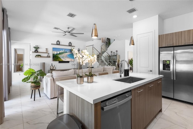17540 SW 46th St, Miramar, FL 33029 - kitchen with stainless steel appliances, a sink, light marble finish floors, open floor plan, and recessed lighting