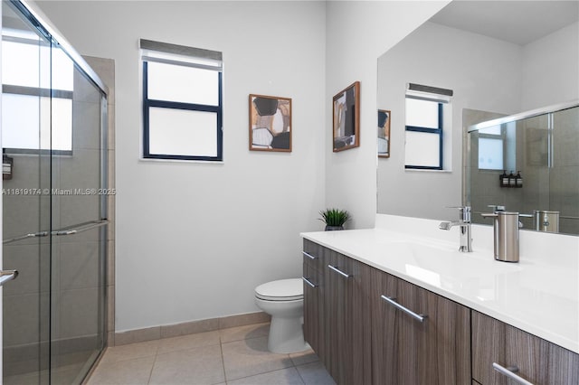 17540 SW 46th St, Miramar, FL 33029 - full bath featuring vanity, toilet, a shower stall, tile patterned floors, and baseboards