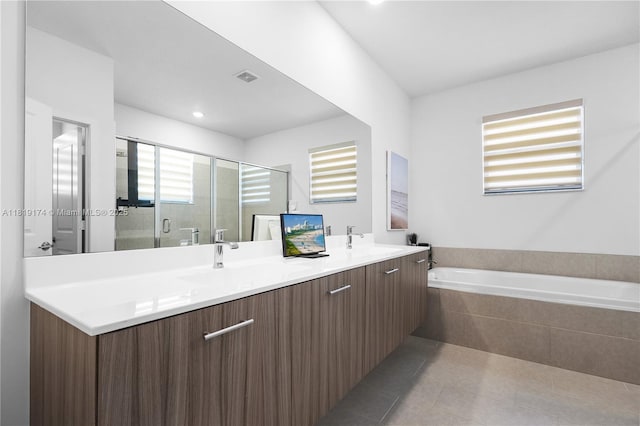 17540 SW 46th St, Miramar, FL 33029 - full bathroom with double vanity, a garden tub, a stall shower, and tile patterned floors