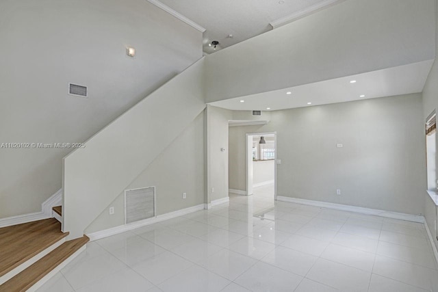 164 Granada Ave, Weston, FL 33326 - unfurnished living room featuring light tile patterned flooring, stairway, crown molding, and recessed lighting