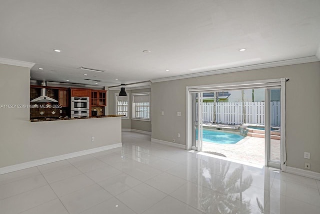 164 Granada Ave, Weston, FL 33326 - unfurnished living room featuring crown molding, light tile patterned floors, and recessed lighting