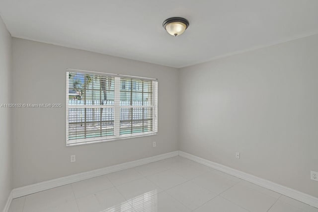 164 Granada Ave, Weston, FL 33326 - empty room featuring baseboards and light tile patterned floors