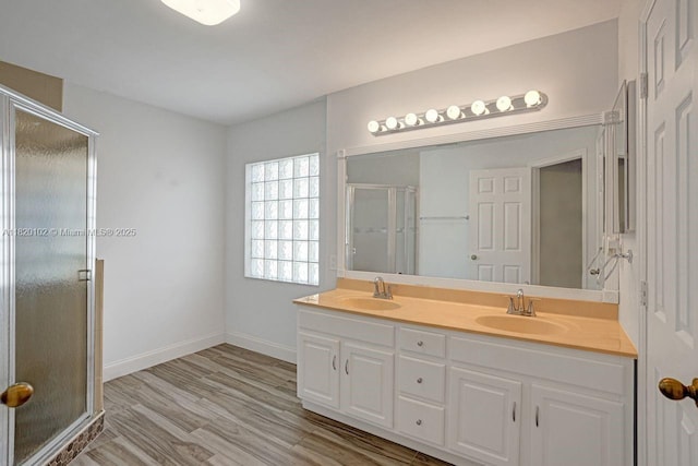 164 Granada Ave, Weston, FL 33326 - full bath with a shower stall, double vanity, and wood finished floors