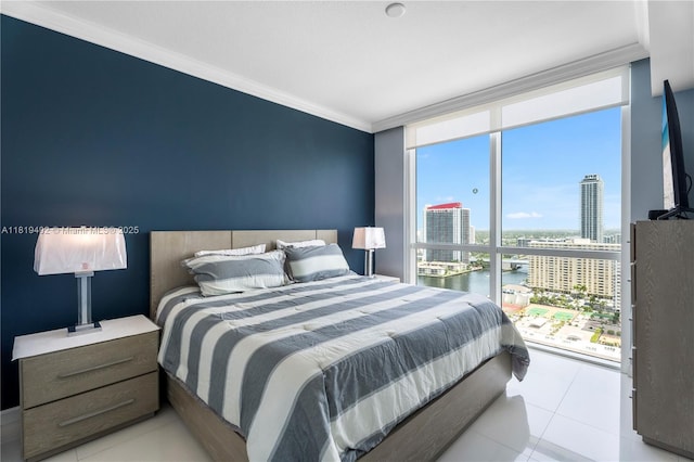 1945 S Ocean Dr Unit 2209, Hallandale Beach, FL 33009 - bedroom with floor to ceiling windows, ornamental molding, and light tile patterned floors