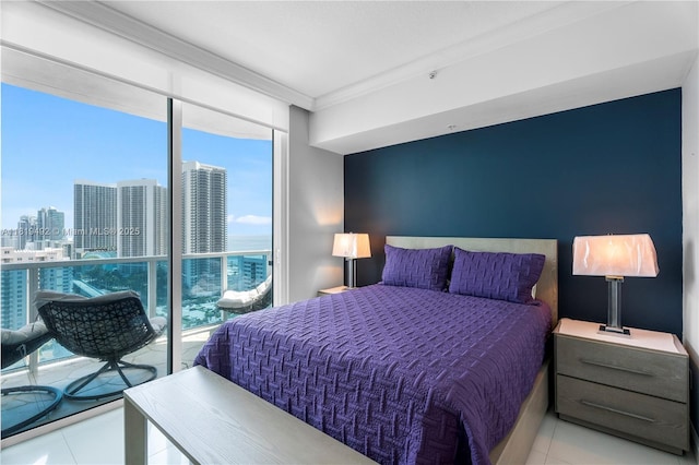 1945 S Ocean Dr Unit 2209, Hallandale Beach, FL 33009 - bedroom with tile patterned flooring, ornamental molding, and a city view
