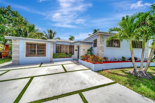 14925 NE 7th Ave, Miami, FL 33161 - view of front of house with stucco siding and stone siding