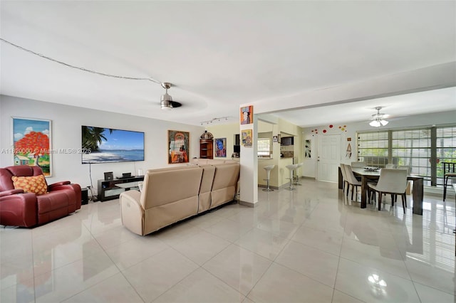 14925 NE 7th Ave, Miami, FL 33161 - living room featuring light tile patterned floors and a ceiling fan