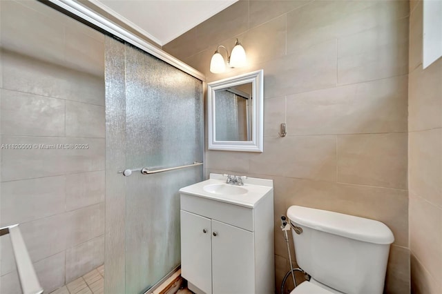 14925 NE 7th Ave, Miami, FL 33161 - bathroom featuring a shower stall, vanity, toilet, and tile walls