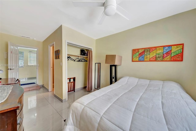 14925 NE 7th Ave, Miami, FL 33161 - bedroom with light tile patterned floors, a ceiling fan, a closet, and baseboards
