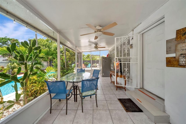 14925 NE 7th Ave, Miami, FL 33161 - sunroom / solarium featuring a ceiling fan and outdoor dining space