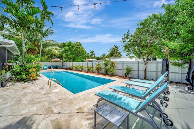 14925 NE 7th Ave, Miami, FL 33161 - view of pool featuring a patio and a fenced backyard