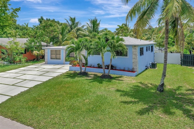 14925 NE 7th Ave, Miami, FL 33161 - view of front of property with driveway and stucco siding