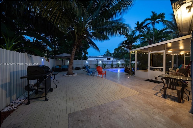 14925 NE 7th Ave, Miami, FL 33161 - fenced backyard featuring a sunroom, a patio area, and area for grilling