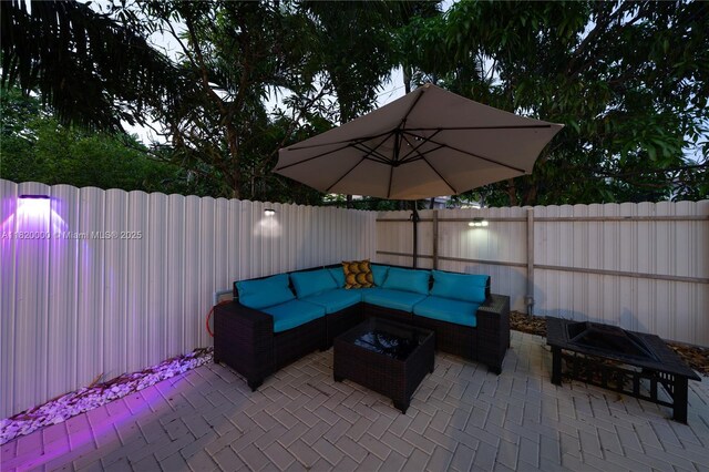 14925 NE 7th Ave, Miami, FL 33161 - fenced backyard featuring outdoor lounge area and a patio