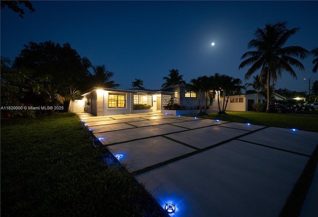 14925 NE 7th Ave, Miami, FL 33161 - view of front facade with a yard