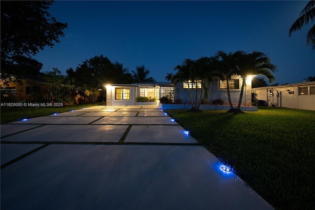 14925 NE 7th Ave, Miami, FL 33161 - view of front of property with driveway and a yard