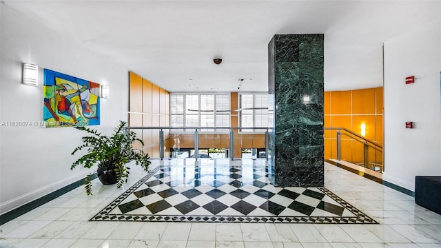 6770 Indian Creek Dr Unit 7B, Miami Beach, FL 33141 - community lobby featuring floor to ceiling windows
