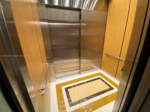 610 Clematis St Unit 721, West Palm Beach, FL 33401 - elevator featuring inlaid floor details