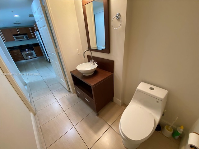 610 Clematis St Unit 721, West Palm Beach, FL 33401 - bathroom featuring tile patterned flooring and vanity